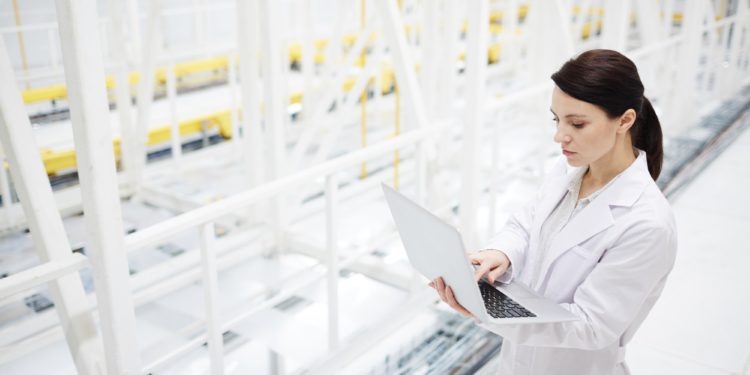 Innovation scientist analyzing bitcoin mining operations