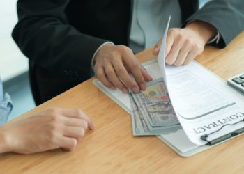 Corruption Concept, Government officials are accepting corruption payments that businessmen deliver.