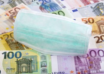 Protective mask on a Swiss money background