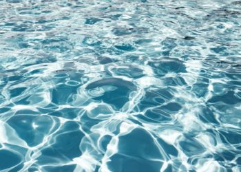 Clear shiny and warm blue water in the pool