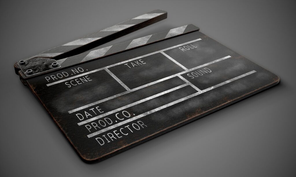 Clapperboard on a dark background close-up.