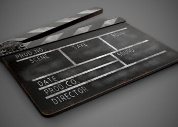 Clapperboard on a dark background close-up.