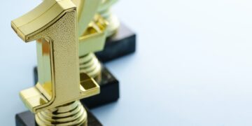 1st, 2nd and 3rd place gold winners trophies