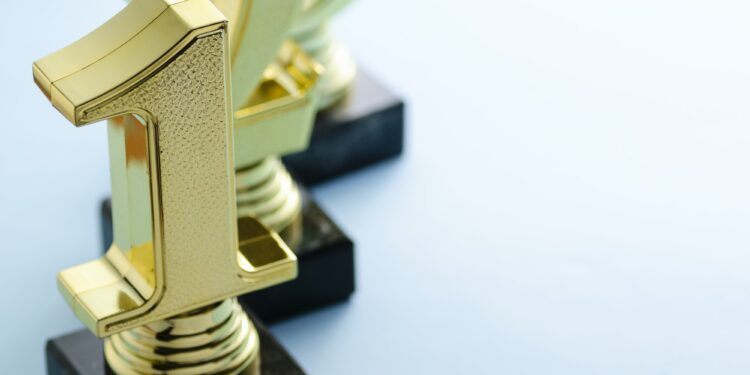 1st, 2nd and 3rd place gold winners trophies