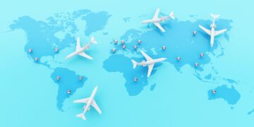 3d Airplanes flying around globe with map pointer.