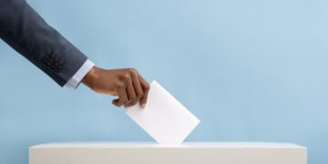 African american man voting for general election in United States