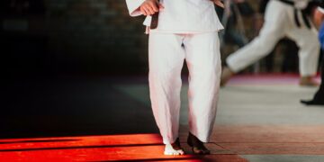 athlete judoka in white kimono