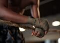 Boxer training on boxing ring