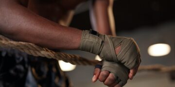 Boxer training on boxing ring