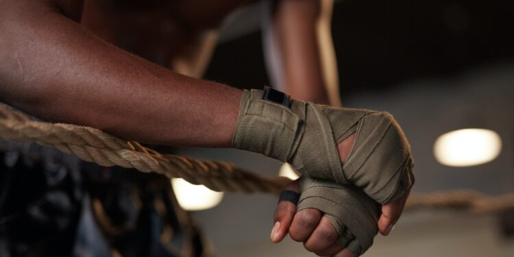 Boxer training on boxing ring