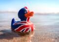 British flag rubber duck in the sea