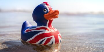 British flag rubber duck in the sea