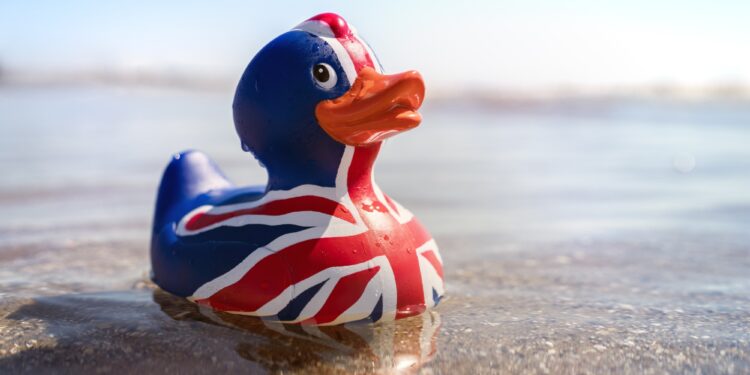 British flag rubber duck in the sea