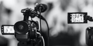 Camera at media conference