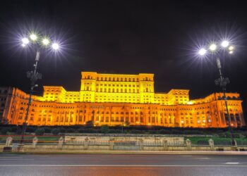 Dramatic evening view of Palace of the Parliament Bucharest city