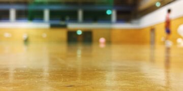 Football practice in a sports hall.