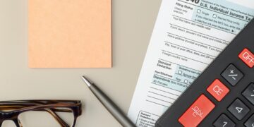 Individual Tax Return Form on table