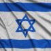Israel flag is depicted on a sports cloth fabric with many folds. Sport team waving banner