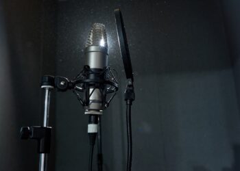 Recording microphone in dark studio