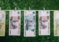 rubles banknotes hanging with clothespins on clothesline, money laundering concept