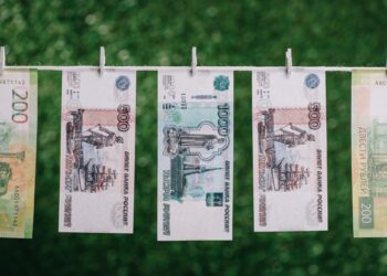 rubles banknotes hanging with clothespins on clothesline, money laundering concept