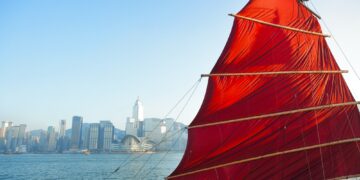sailboat flag in Hong Kong harbor