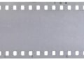 Strip of old celluloid film with dust and scratches