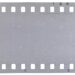 Strip of old celluloid film with dust and scratches