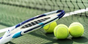 Tennis balls on a tennis court