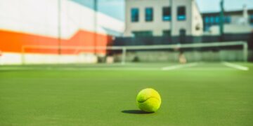 The tennis ball on a tennis court