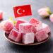 Turkish Delight, Rose Flavour in a Copper Plate with Turkish Flag. Grey Background. Close up.