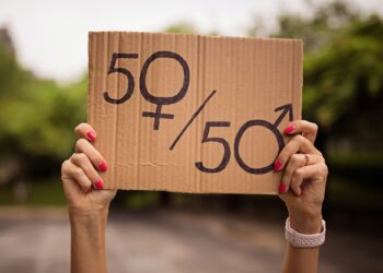 Woman Holding Hands Gender Equality Sign